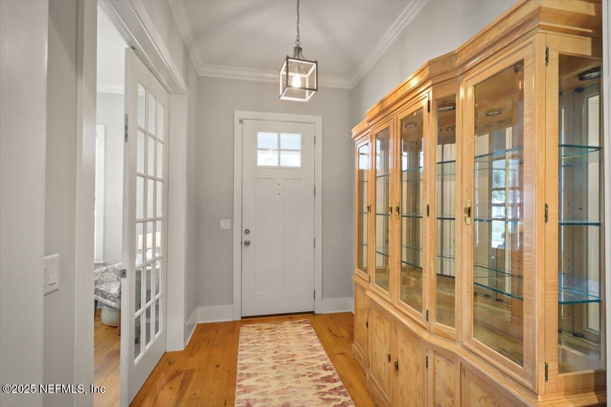 740 Paradise Lane Atlantic Beach, FL 32233 - Photo 3 of 38 a view of a hallway with a door
