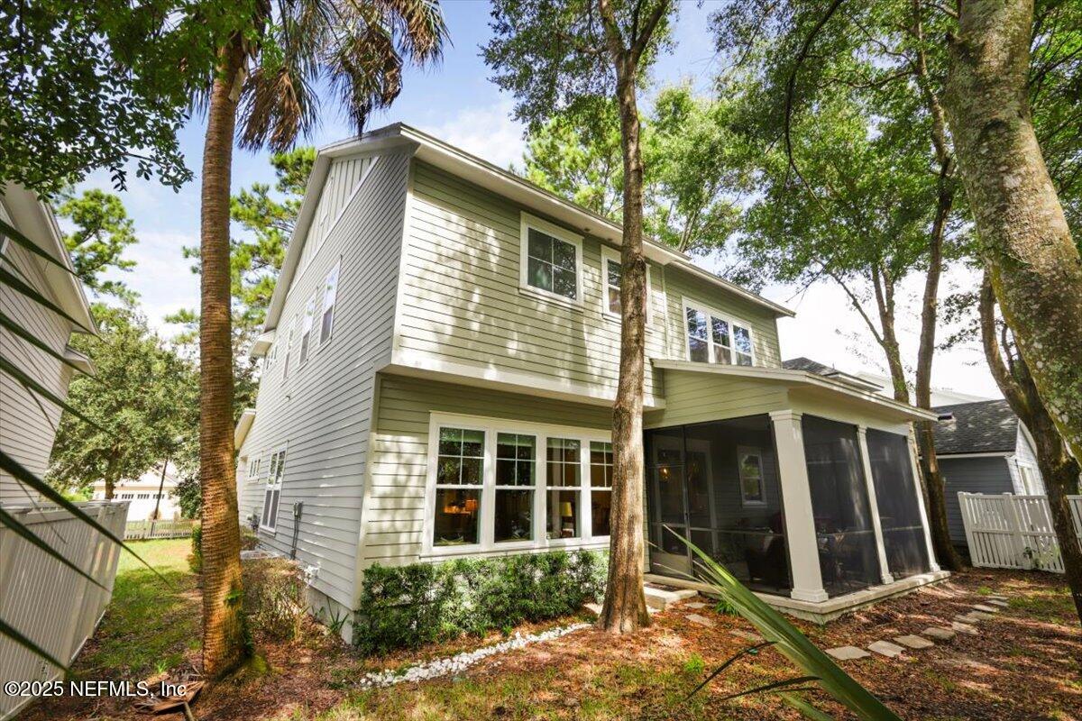 740 Paradise Lane Atlantic Beach, FL 32233 - Photo 37 of 38 front view of a house with a tree