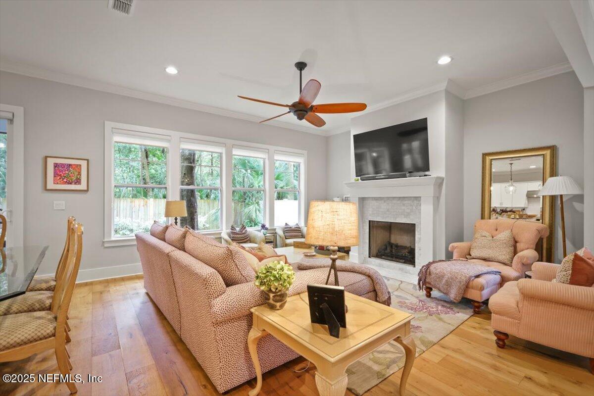 740 Paradise Lane Atlantic Beach, FL 32233 - Photo 7 of 38 a living room with furniture a fireplace and a flat screen tv