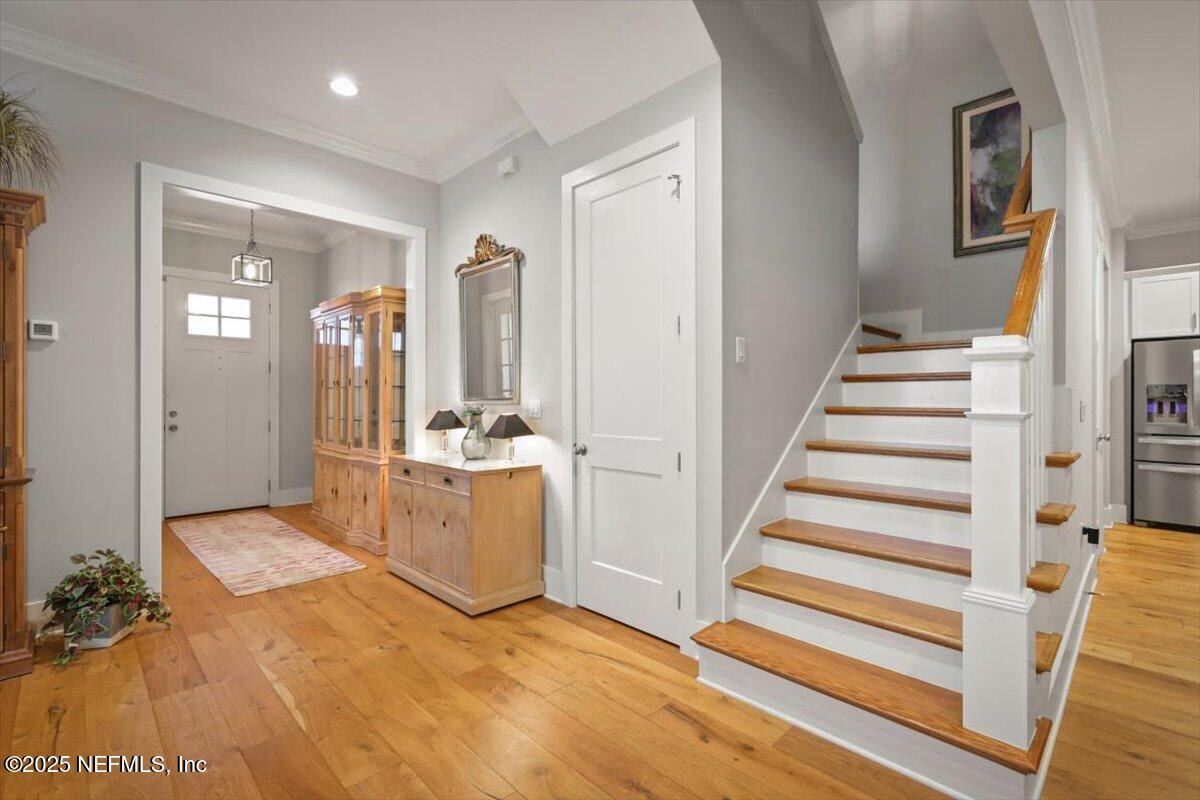 740 Paradise Lane Atlantic Beach, FL 32233 - Photo 9 of 38 a view of entryway with white walls and open front door