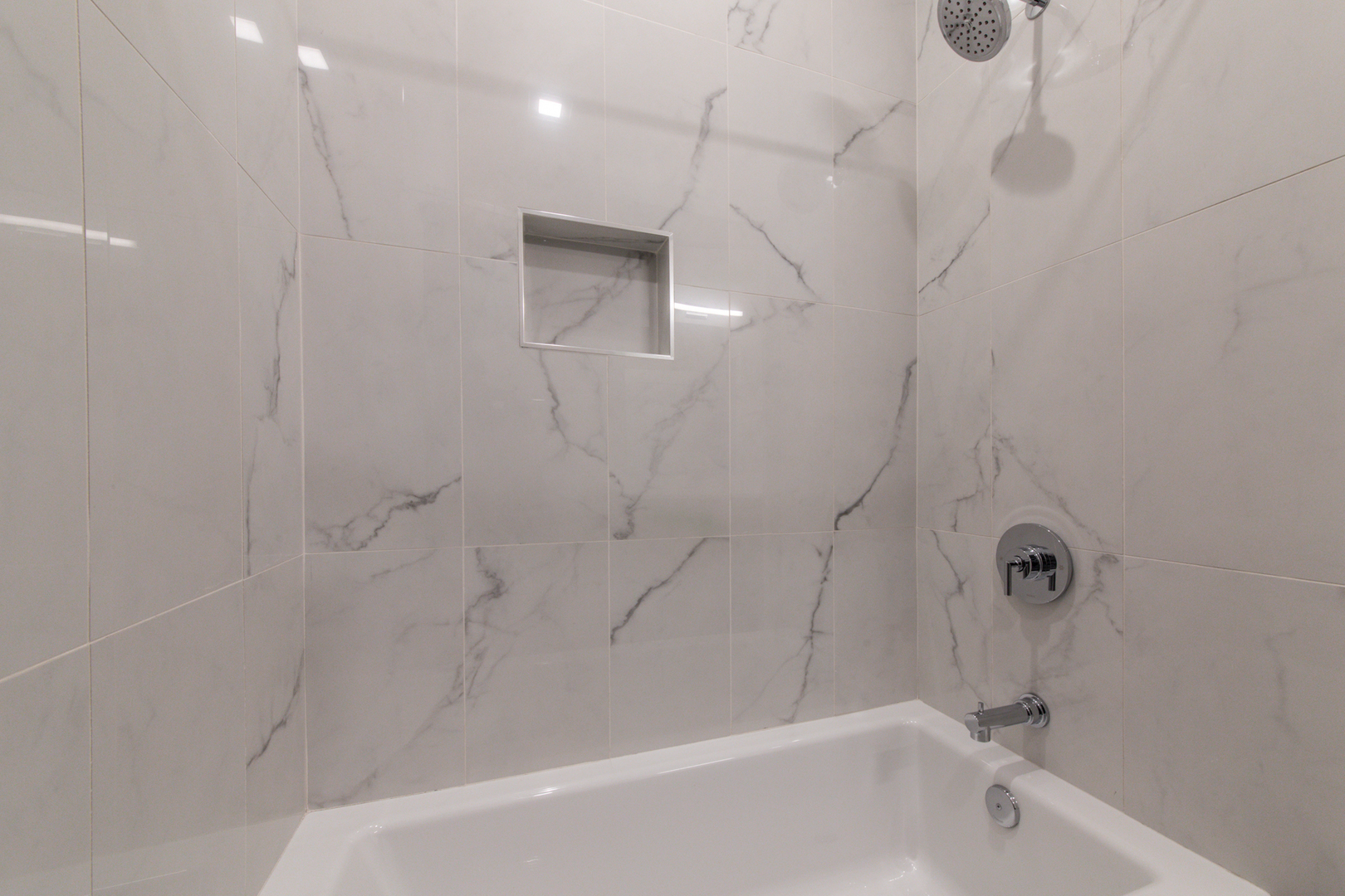 1116 Courtland Avenue, Unit 203 Park Ridge, IL 60068 - Photo 14 of 16 a bathroom with a shower