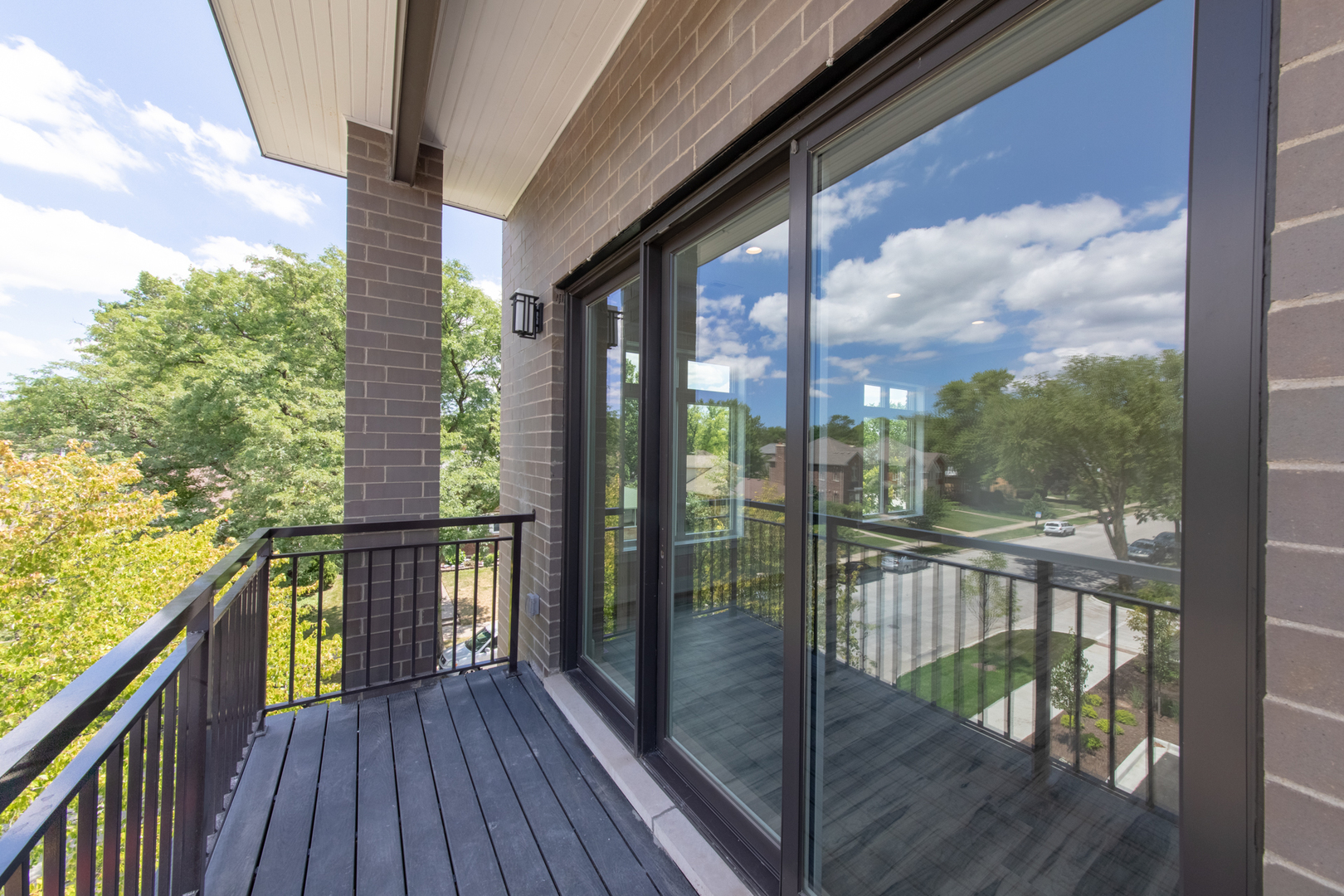1116 Courtland Avenue, Unit 203 Park Ridge, IL 60068 - Photo 16 of 16 a view of a balcony with wooden floor