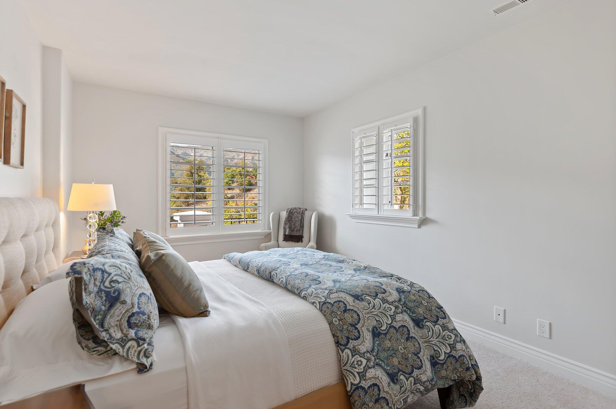 130 Via Alicia Santa Barbara, CA 93108 - Photo 11 of 16 a bedroom with a bed and a window with outer view