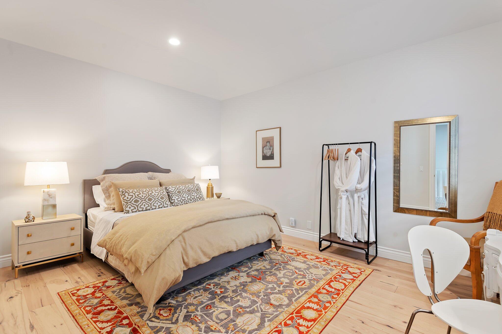 130 Via Alicia Santa Barbara, CA 93108 - Photo 13 of 16 a bedroom with a bed and a chair