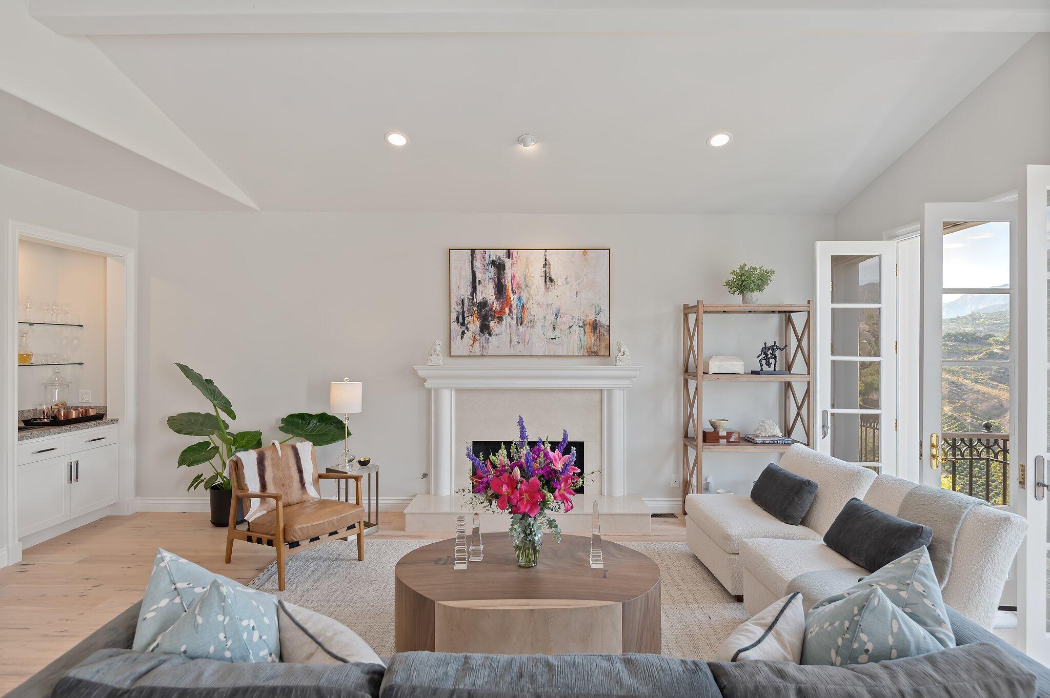 130 Via Alicia Santa Barbara, CA 93108 - Photo 2 of 16 a living room with furniture and a chandelier