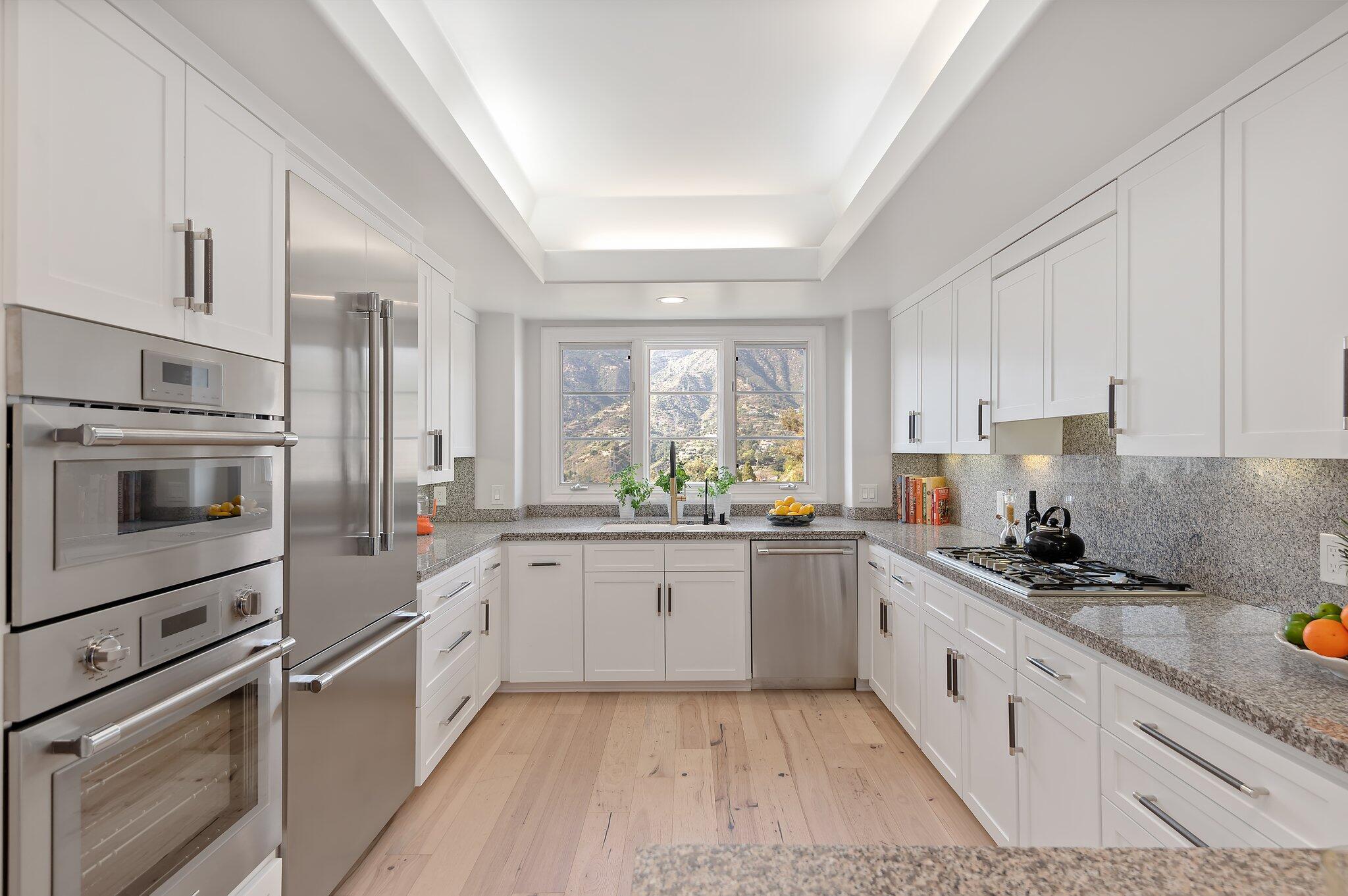 130 Via Alicia Santa Barbara, CA 93108 - Photo 5 of 16 a kitchen with granite countertop a sink stainless steel appliances and cabinets