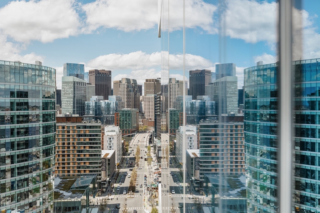 150 Seaport Boulevard, Unit 14B Boston, MA 02210 - Photo 40 of 42 a view of a city with tall buildings