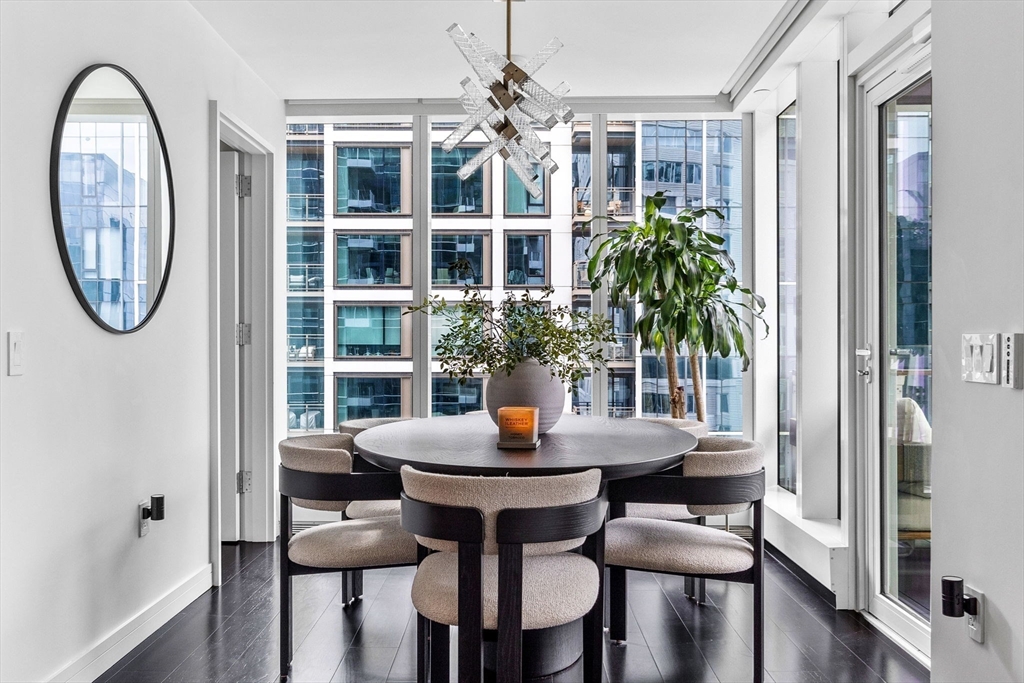 150 Seaport Boulevard, Unit 14B Boston, MA 02210 - Photo 5 of 42 a view of a dining room with furniture and window