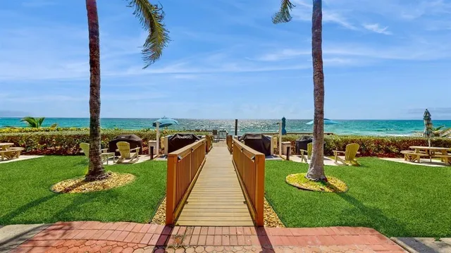 a view of a lake with a garden