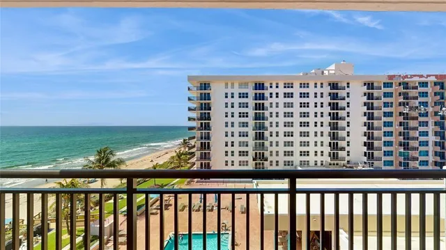 a view of balcony with a floor to ceiling window