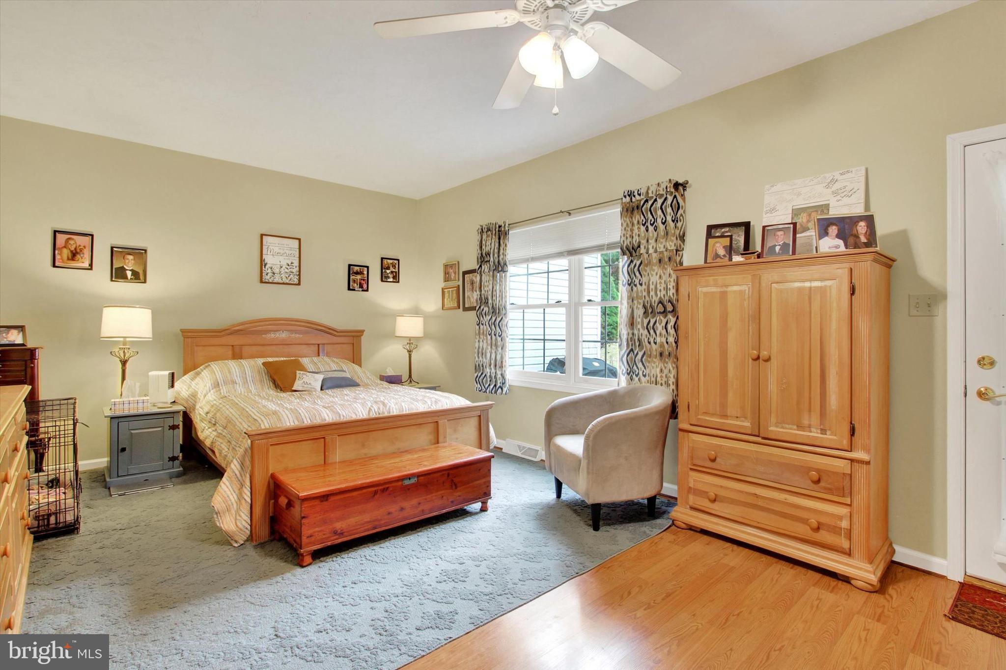 67 Hunters Trail Gettysburg, PA 17325 - Photo 17 of 30 a bedroom with a bed chair and window