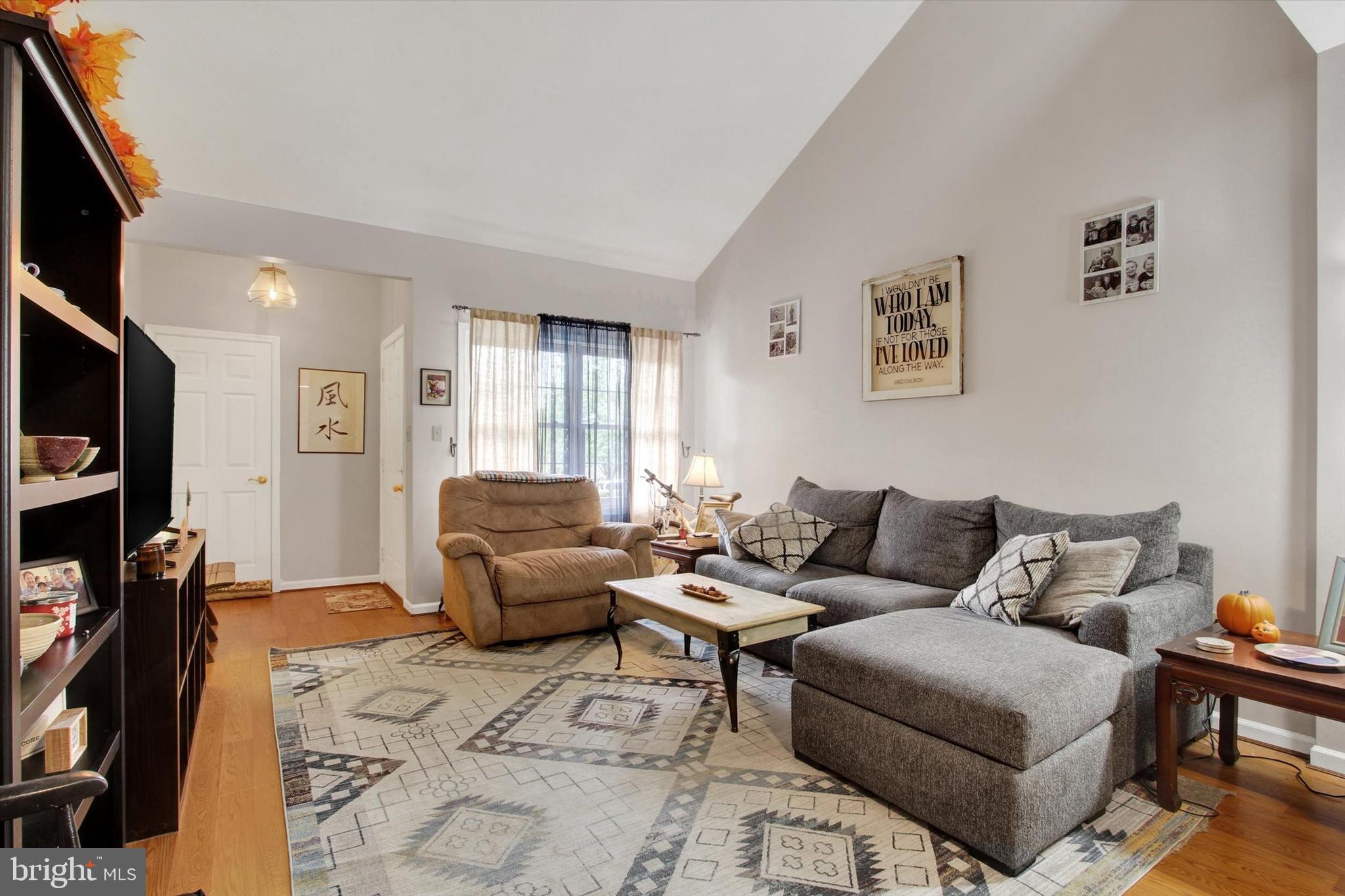 67 Hunters Trail Gettysburg, PA 17325 - Photo 4 of 30 a living room with furniture and a flat screen tv