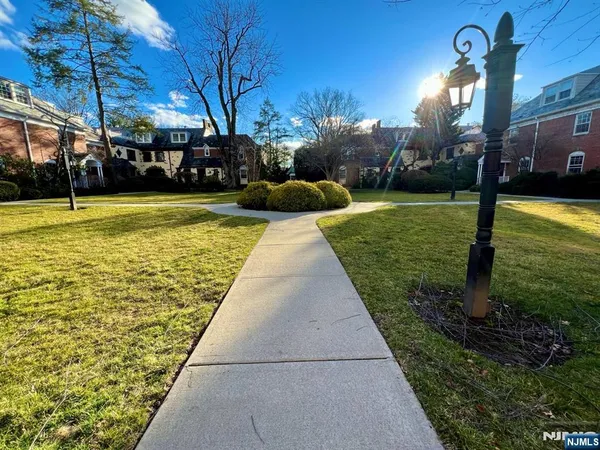 a view of swimming pool with yard
