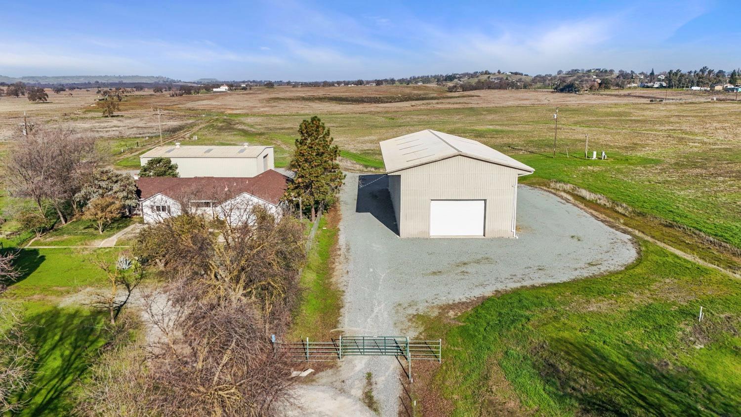 11402 Shelton Road Linden, CA 95236 - Photo 16 of 38 a view of a lake with a yard
