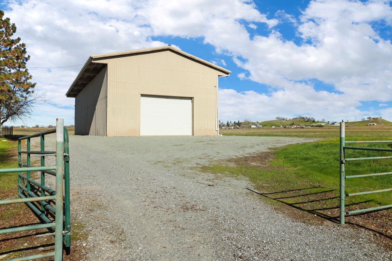 11402 Shelton Road Linden, CA 95236 - Photo 34 of 38 a view of a house with a backyard