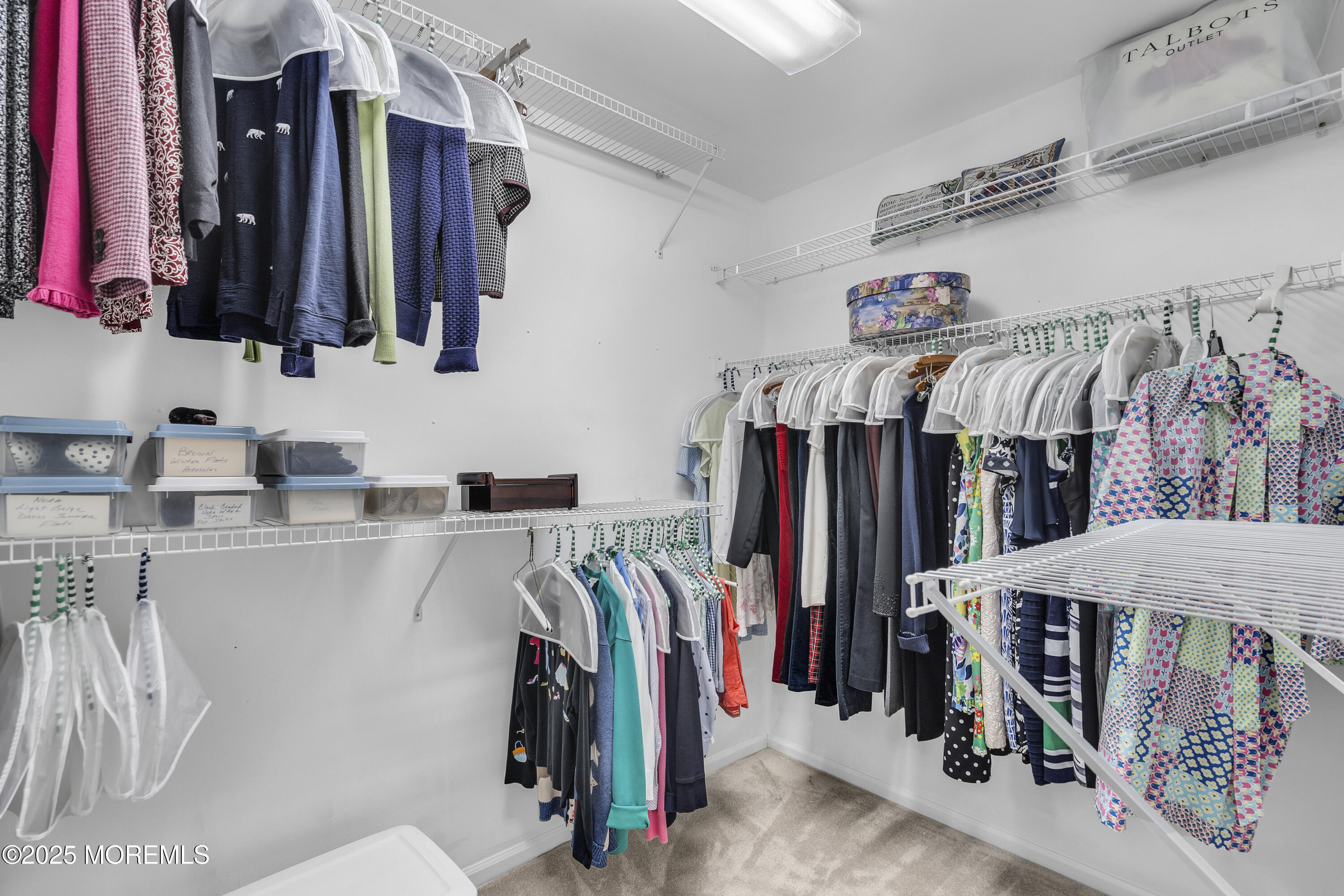 2 Seminole Court Jackson, NJ 08527 - Photo 25 of 32 a view of walk in closet with clothes and shoes