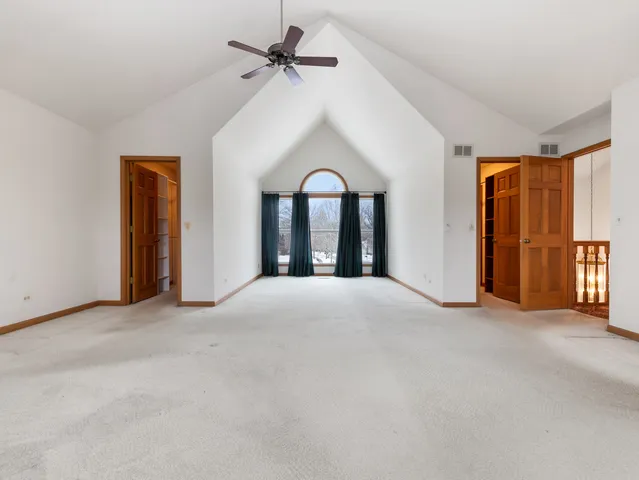 a view of a living room with bathroom
