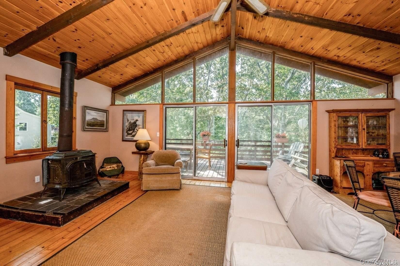 292 Little Fresh Pond Road Southampton, NY 11968 - Photo 14 of 46 Spacious Open Living Room With Wood Burning Stove