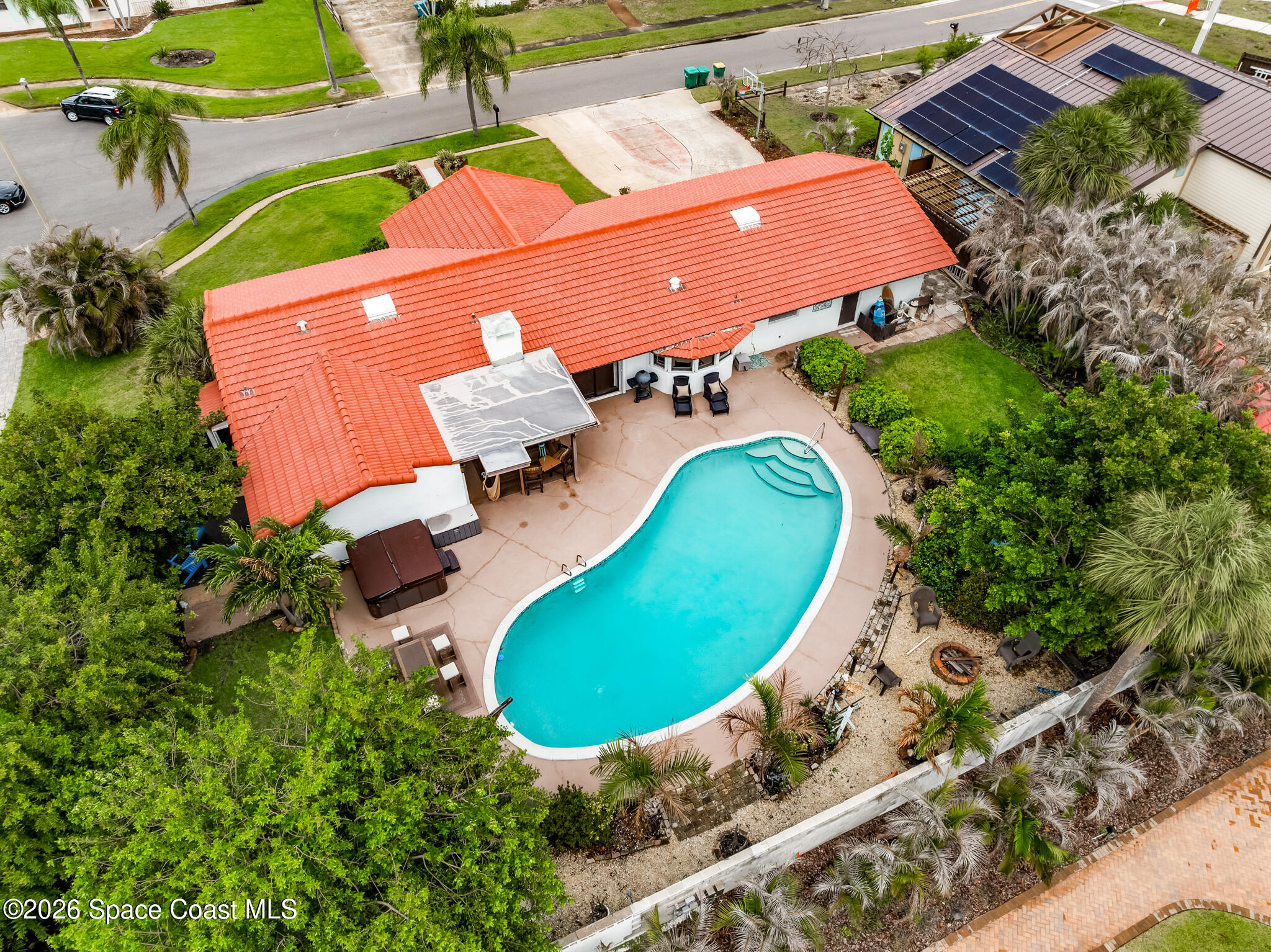 305 Sand Pine Road Indialantic, FL 32903 - Photo 63 of 76 an aerial view of a house with swimming pool