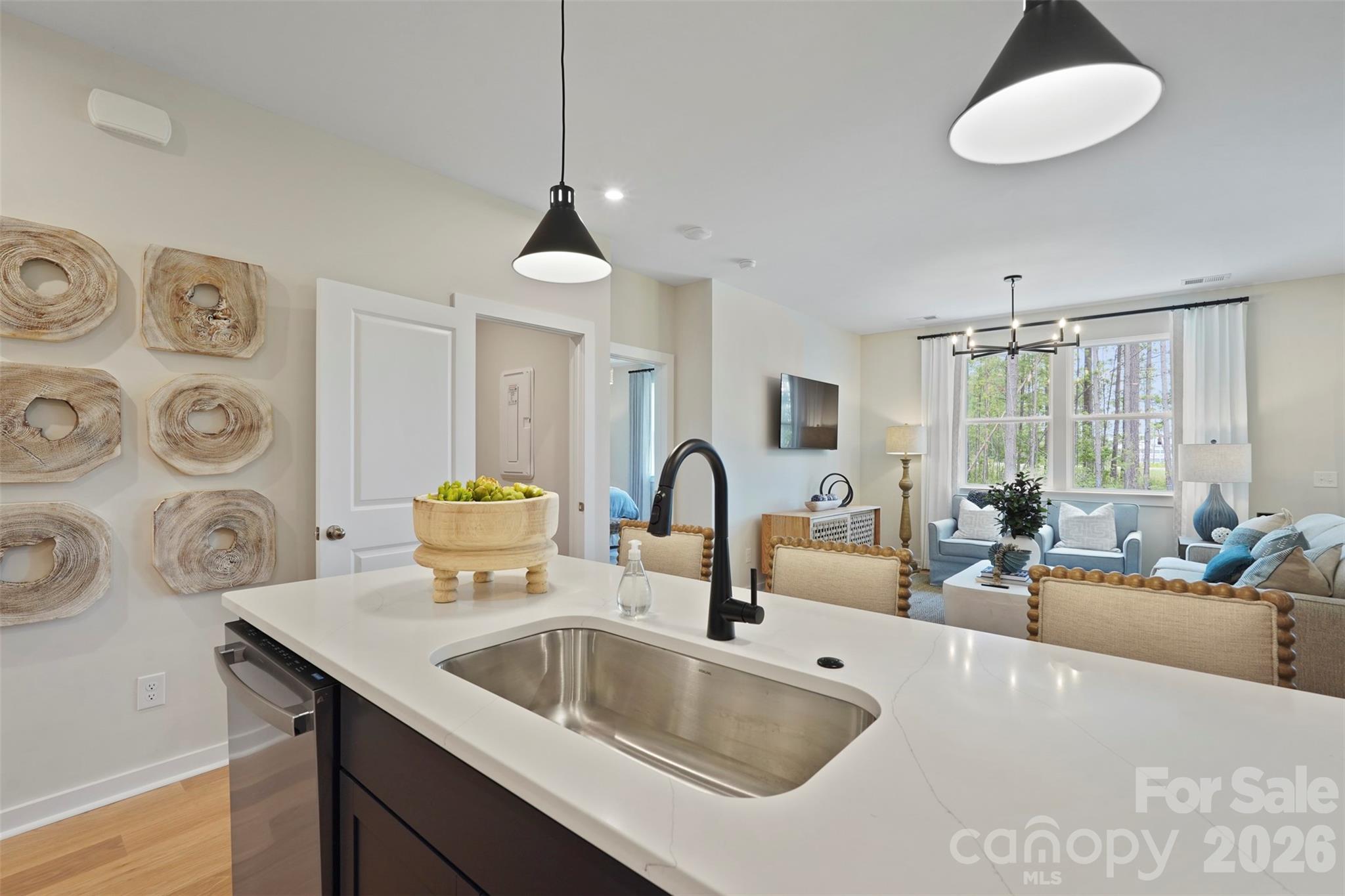 1099 Arundle Road Sherrills Ford, NC 28673 - Photo 13 of 40 a kitchen with a sink cabinets and a chandelier