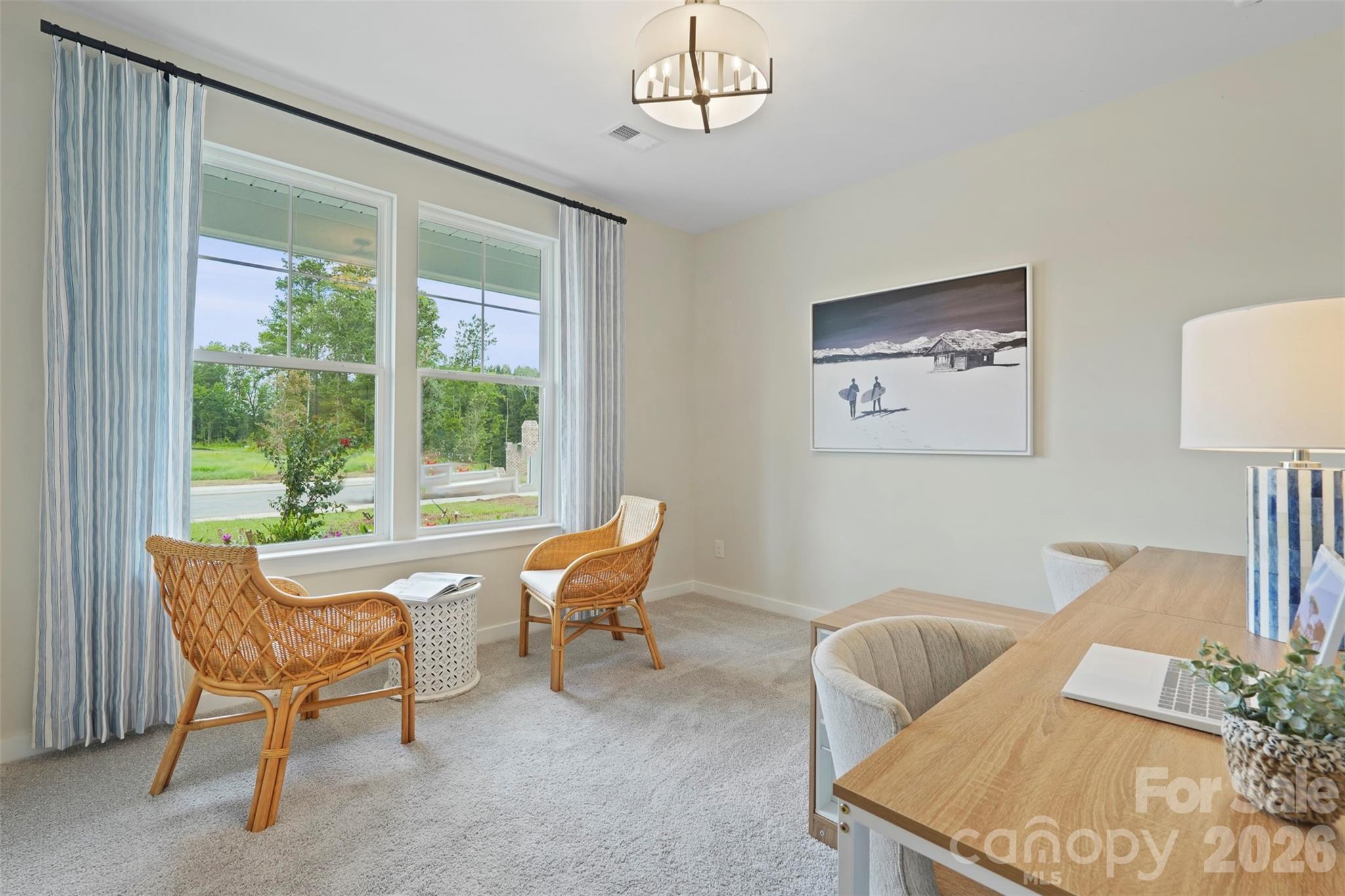 1099 Arundle Road Sherrills Ford, NC 28673 - Photo 21 of 40 a living room with furniture and a large window