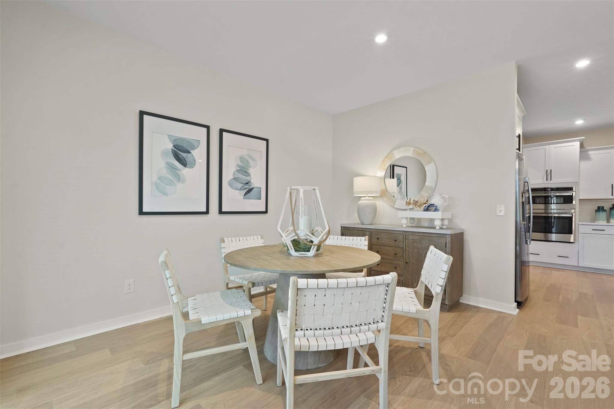 1099 Arundle Road Sherrills Ford, NC 28673 - Photo 23 of 40 a dining room with furniture and wooden floor