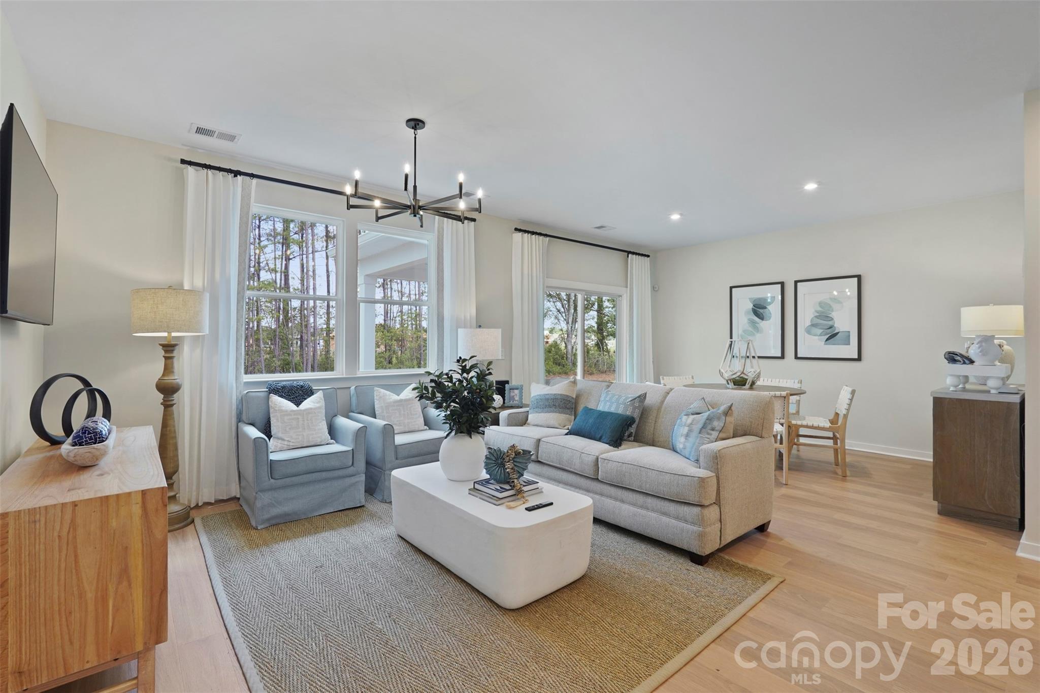 1099 Arundle Road Sherrills Ford, NC 28673 - Photo 25 of 40 a living room with furniture and a large window