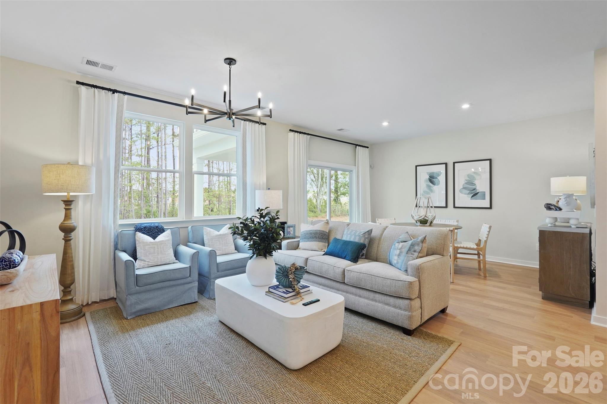1099 Arundle Road Sherrills Ford, NC 28673 - Photo 26 of 40 a living room with furniture and a large window