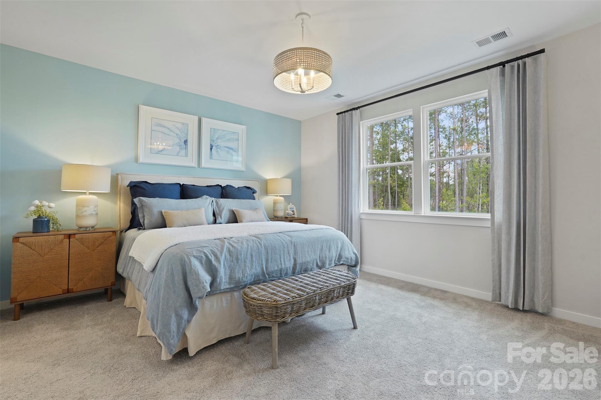 1099 Arundle Road Sherrills Ford, NC 28673 - Photo 4 of 40 a bedroom with a bed and a window