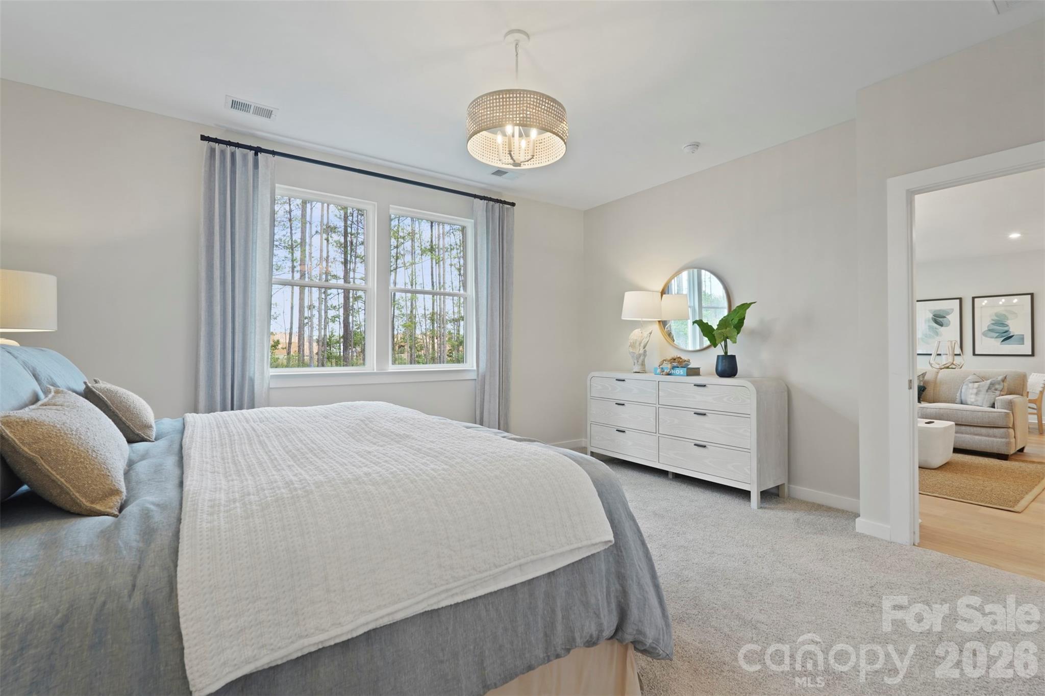 1099 Arundle Road Sherrills Ford, NC 28673 - Photo 6 of 40 a bedroom with a bed and window