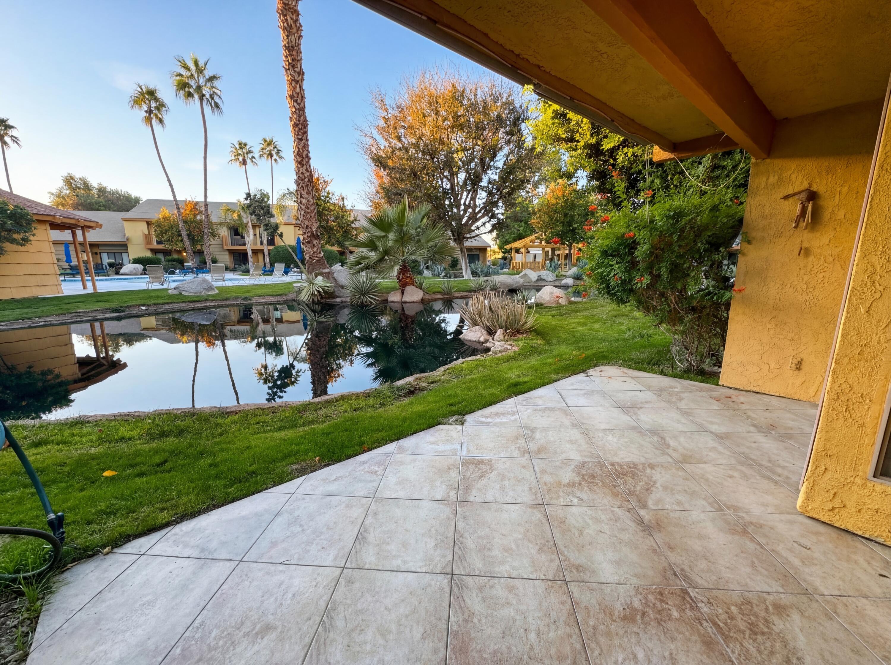 48255 Monroe Street, Unit 20 Indio, CA 92201 - Photo 17 of 21 a view of a garden with plants