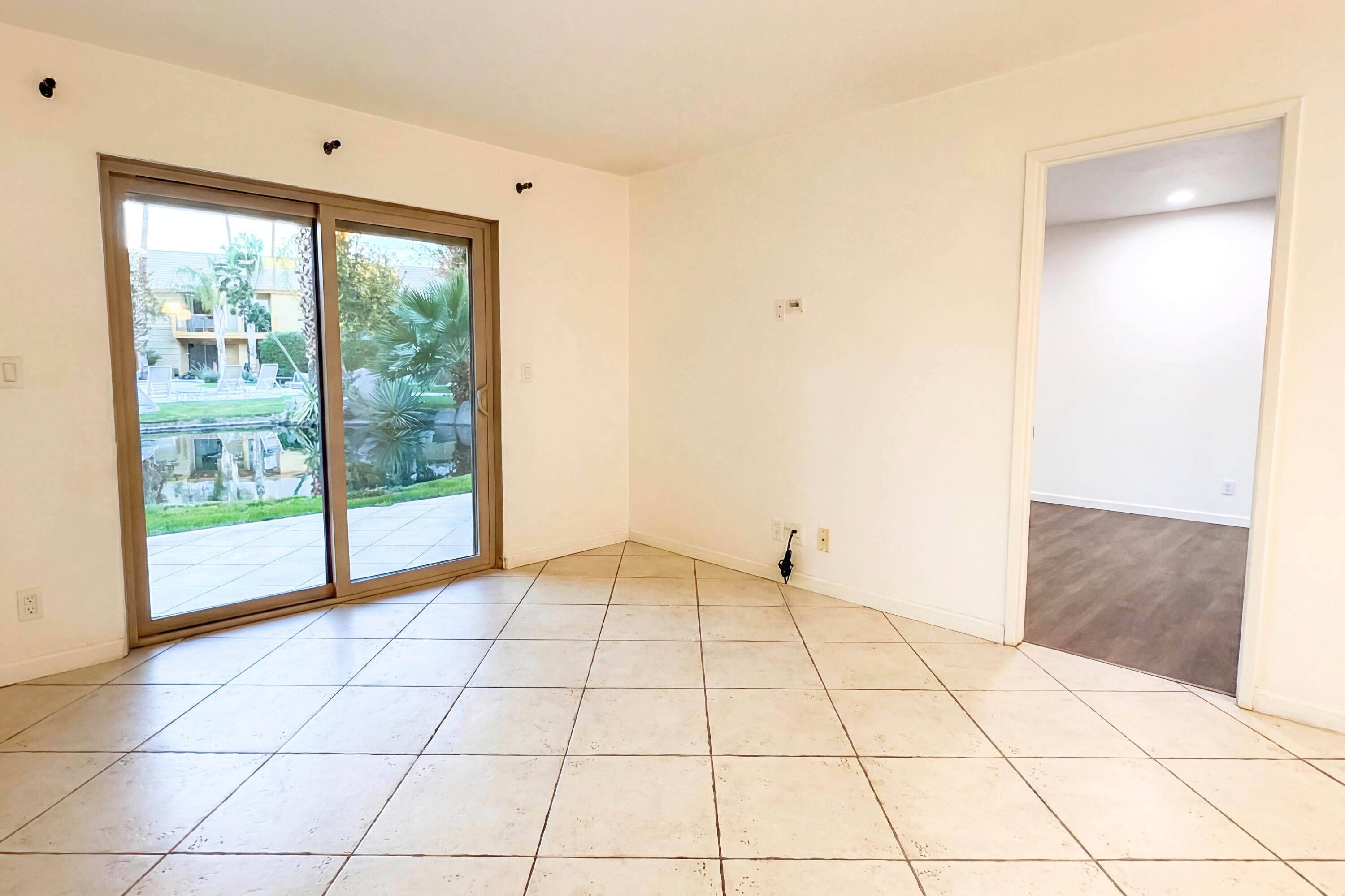 48255 Monroe Street, Unit 20 Indio, CA 92201 - Photo 7 of 21 a view of an empty room and window