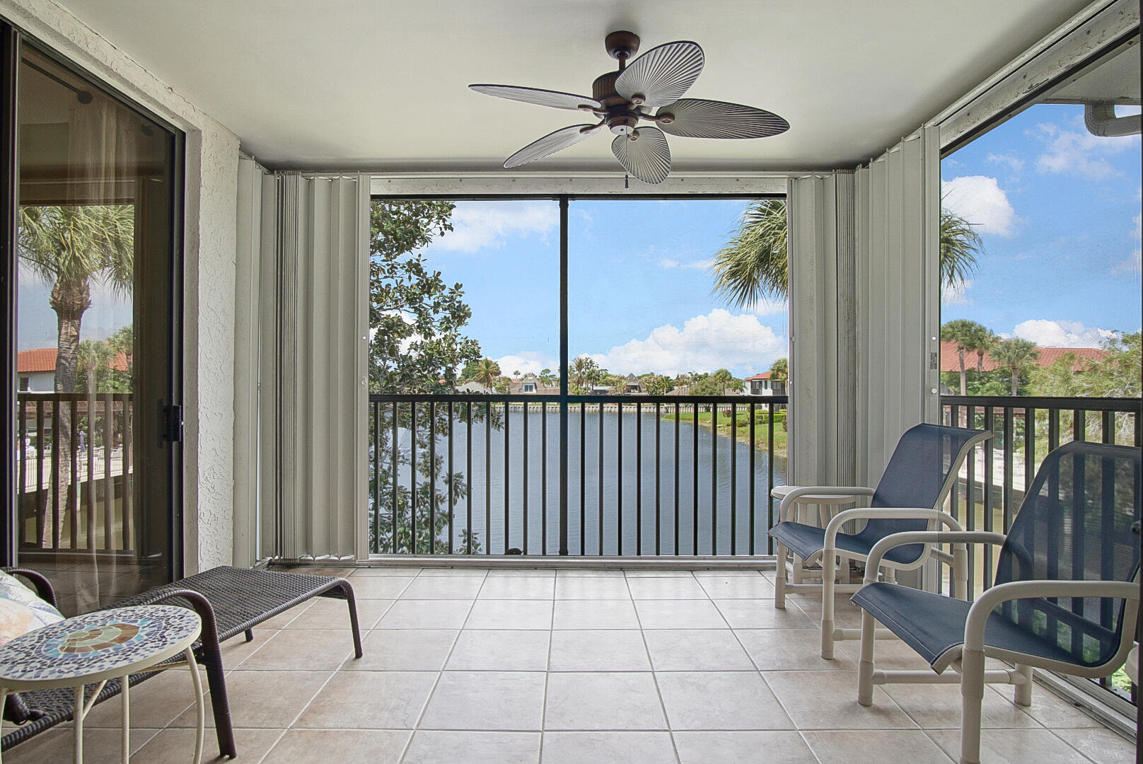 6041 Southeast Landing Way Stuart, FL 34997 - Photo 1 of 30 a view of a balcony with furniture