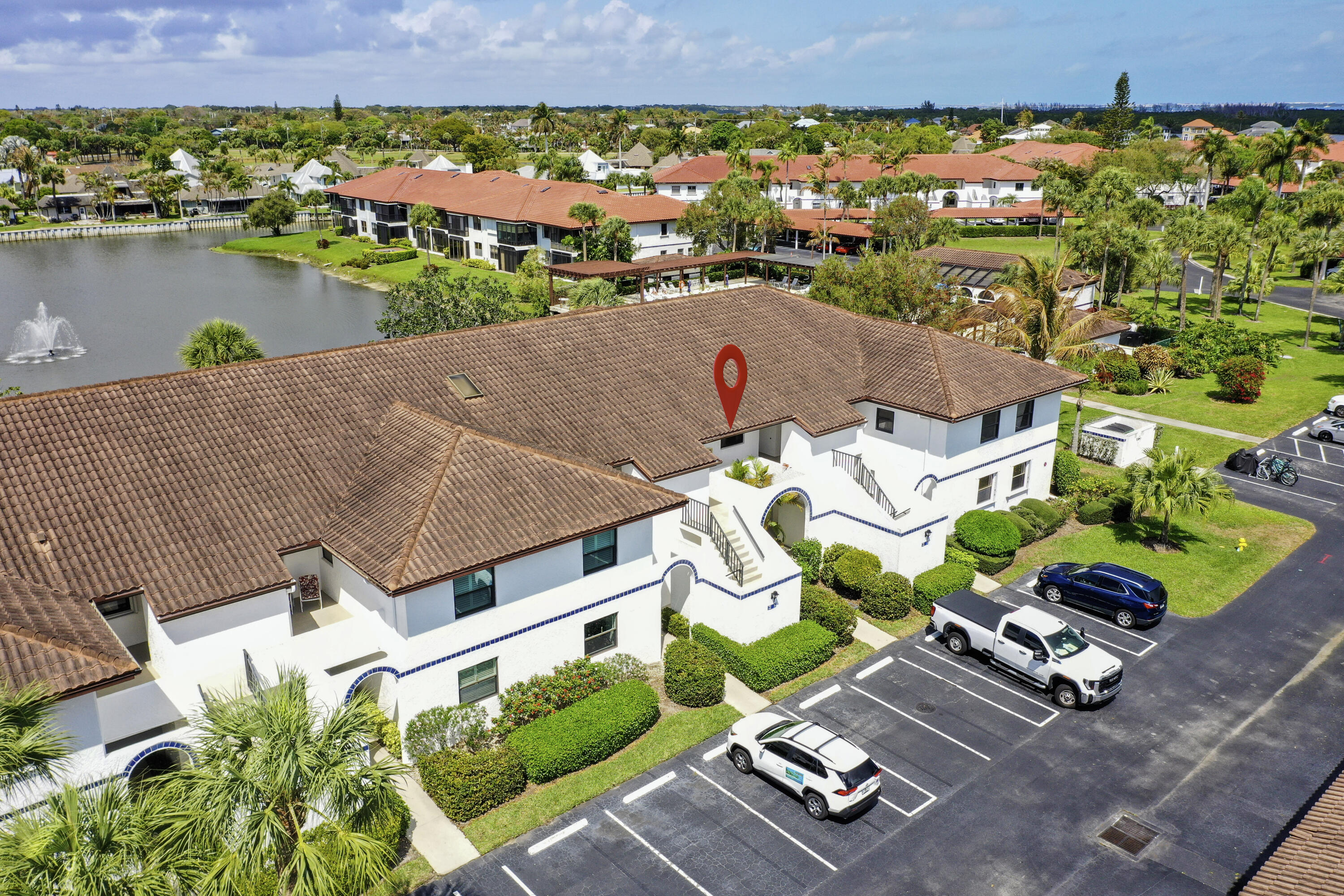6041 Southeast Landing Way Stuart, FL 34997 - Photo 12 of 30 an aerial view of a house with a swimming pool yard and outdoor seating