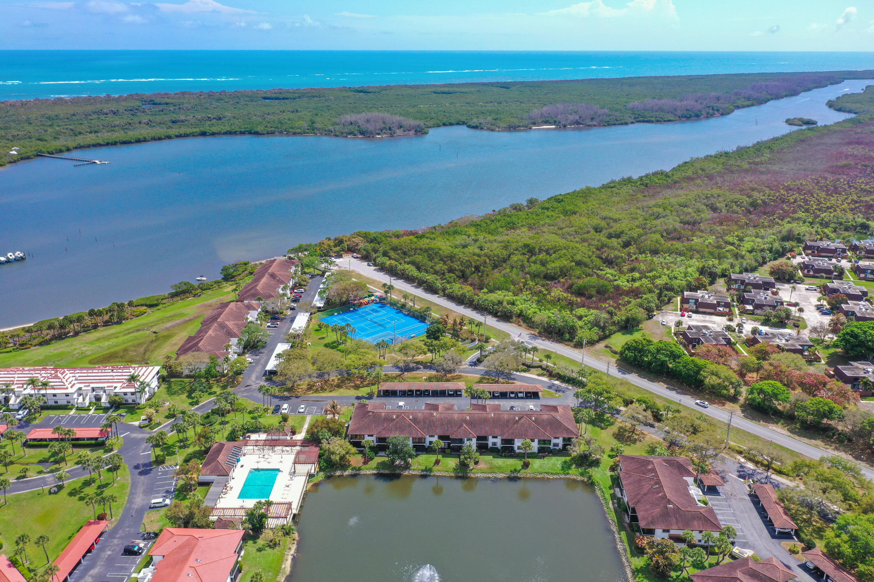 6041 Southeast Landing Way Stuart, FL 34997 - Photo 26 of 30 a view of a city and an ocean