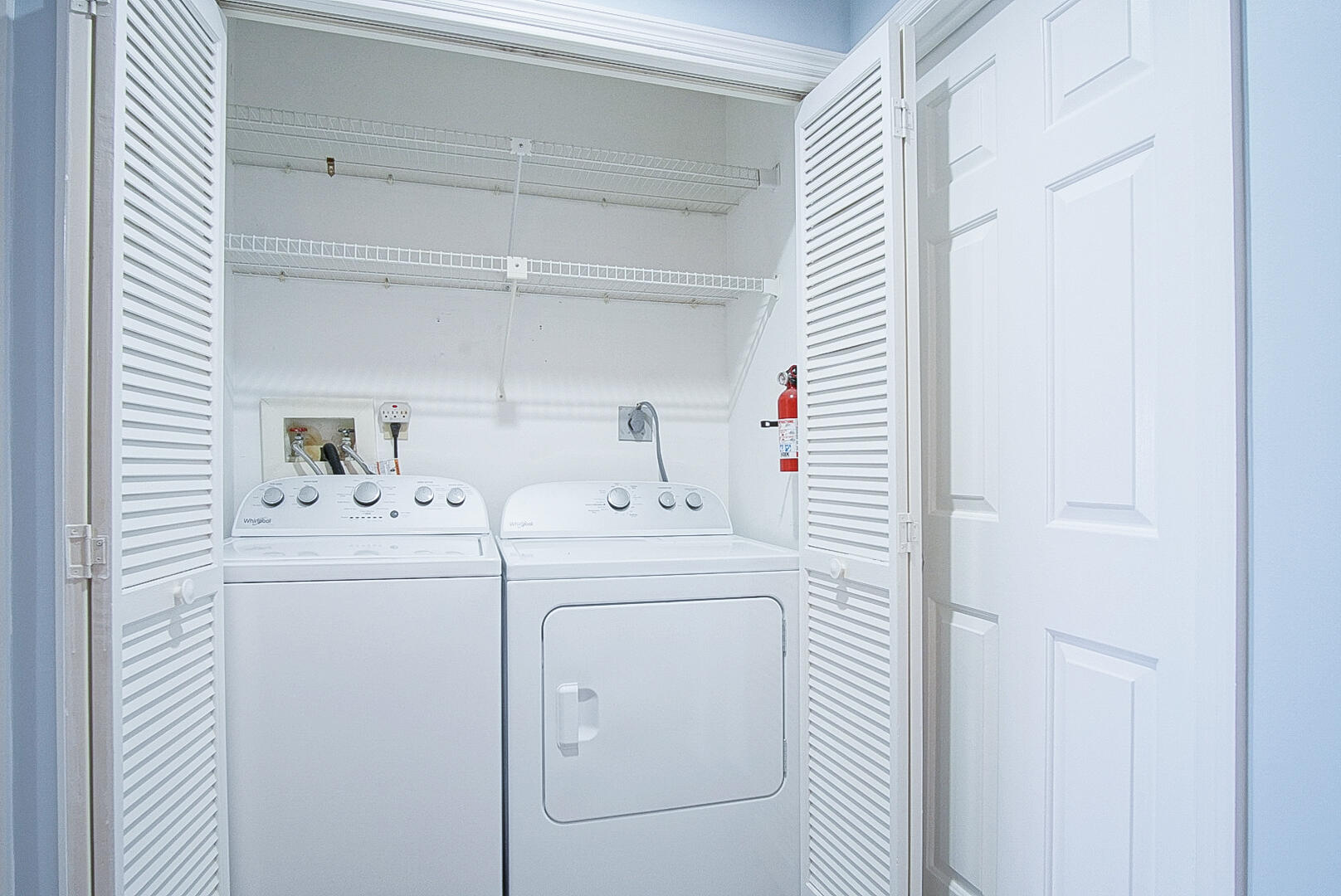 6041 Southeast Landing Way Stuart, FL 34997 - Photo 29 of 30 a utility room with dryer and washer