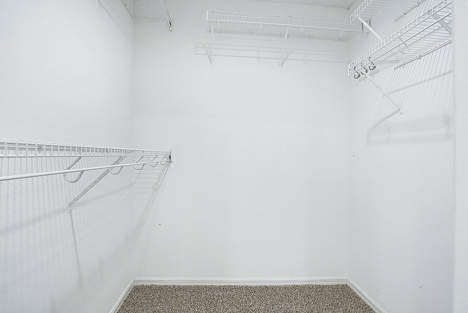 6041 Southeast Landing Way Stuart, FL 34997 - Photo 30 of 30 a view of a room with racks on the wall