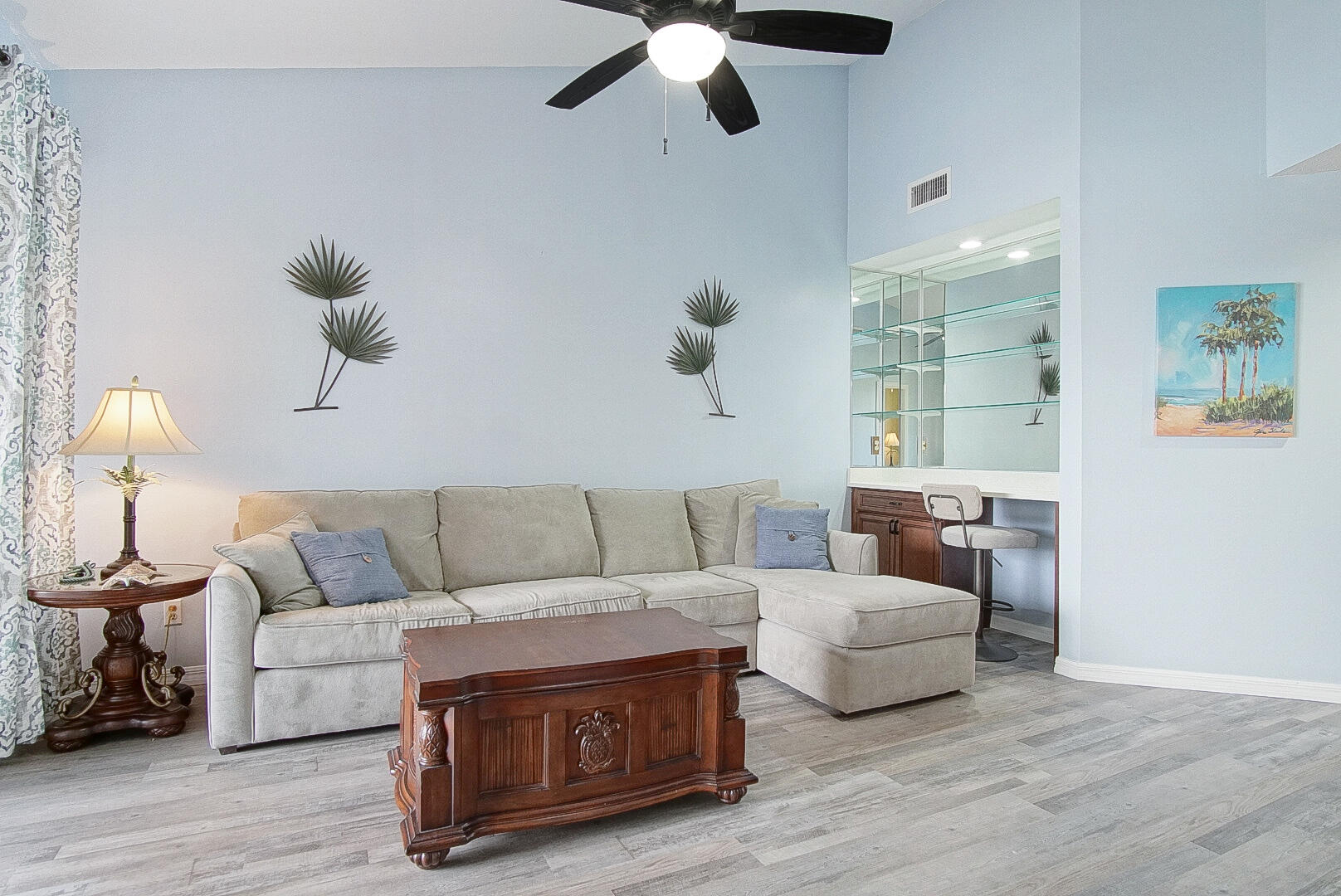 6041 Southeast Landing Way Stuart, FL 34997 - Photo 9 of 30 a living room with furniture and a chandelier