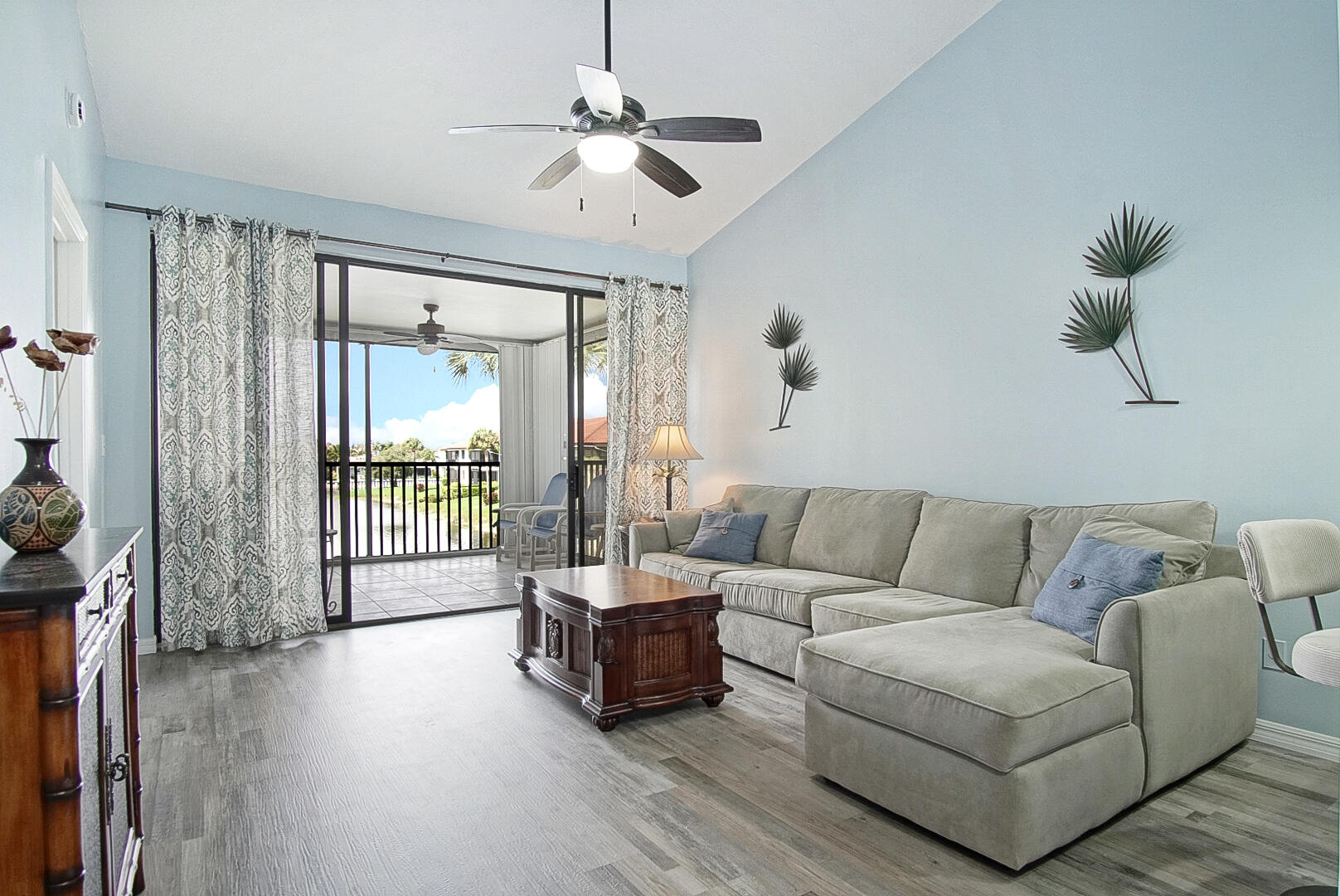 6041 Southeast Landing Way Stuart, FL 34997 - Photo 10 of 30 a living room with furniture and a large window