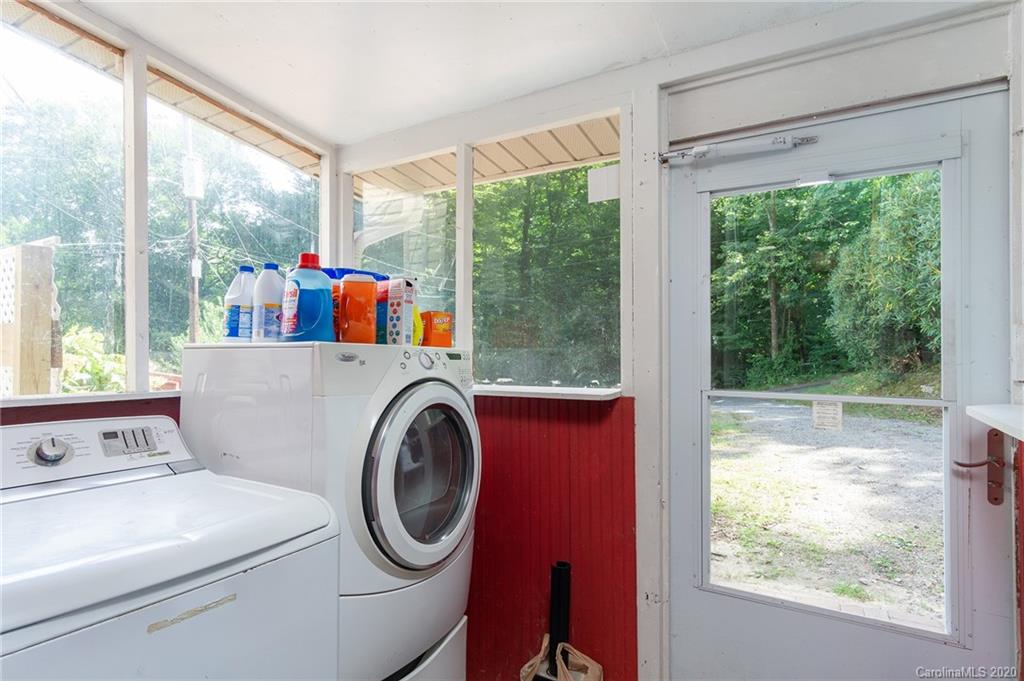27 New Valley Road Swannanoa, NC 28778 - Photo 13 of 42 a utility room with dryer and washer