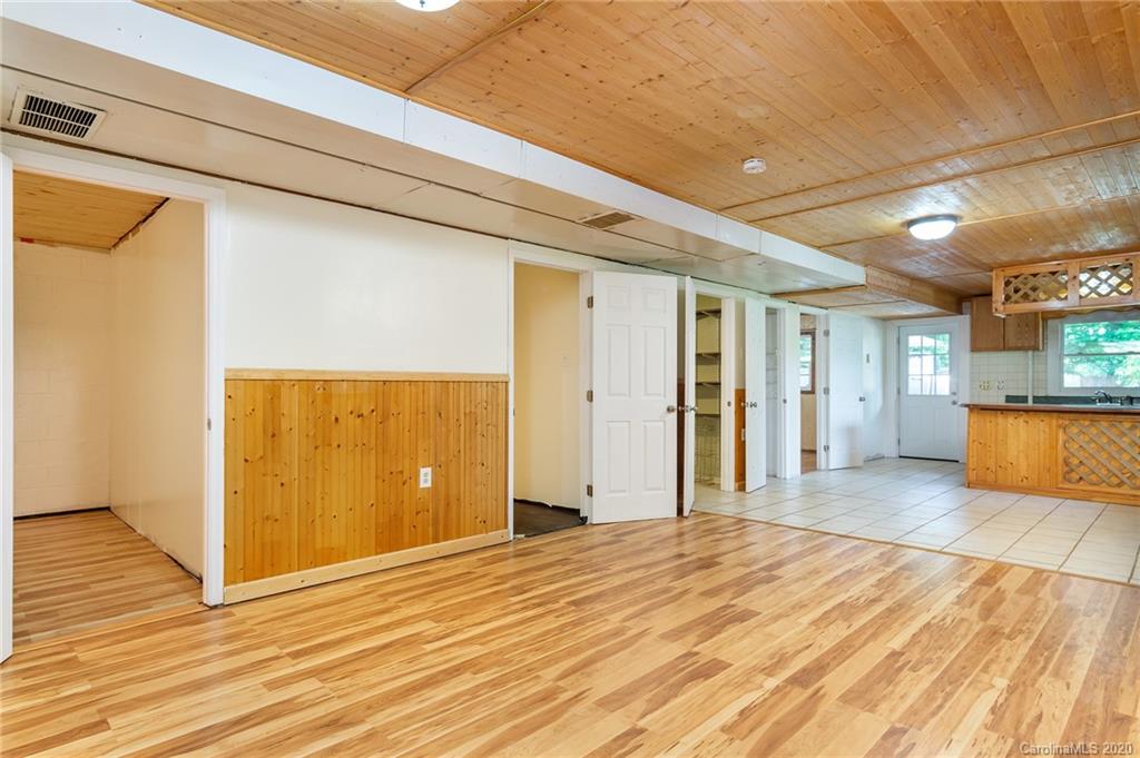 27 New Valley Road Swannanoa, NC 28778 - Photo 19 of 42 a view of a livingroom with wooden floor