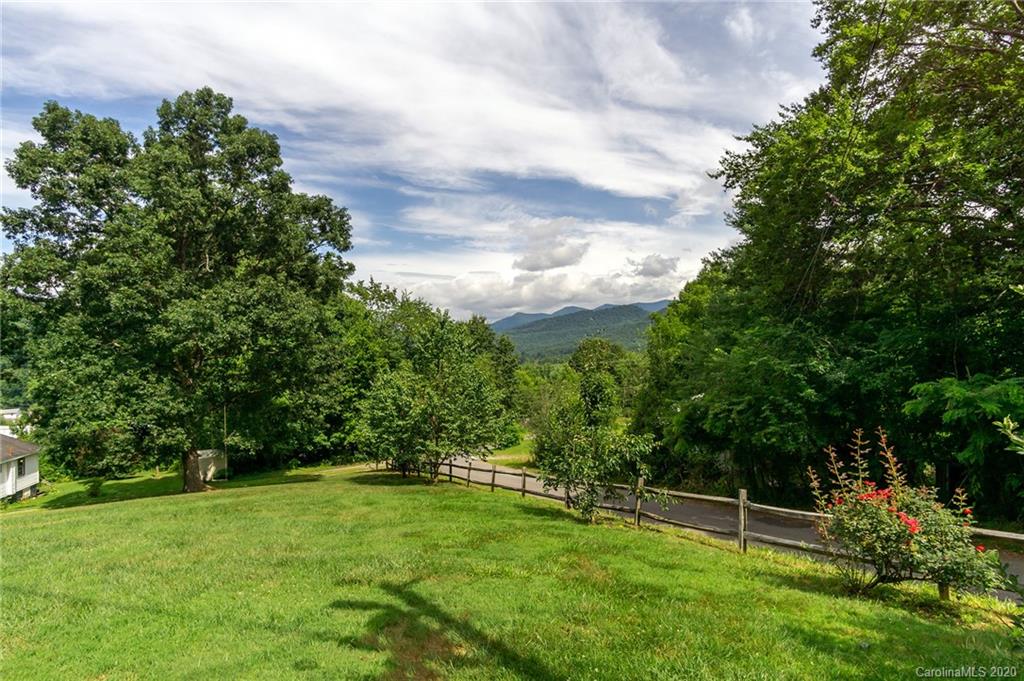 27 New Valley Road Swannanoa, NC 28778 - Photo 3 of 42 a view of an outdoor space and a yard