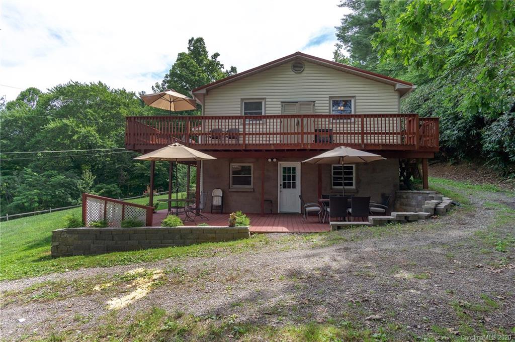 27 New Valley Road Swannanoa, NC 28778 - Photo 37 of 42 a view of a house with a yard