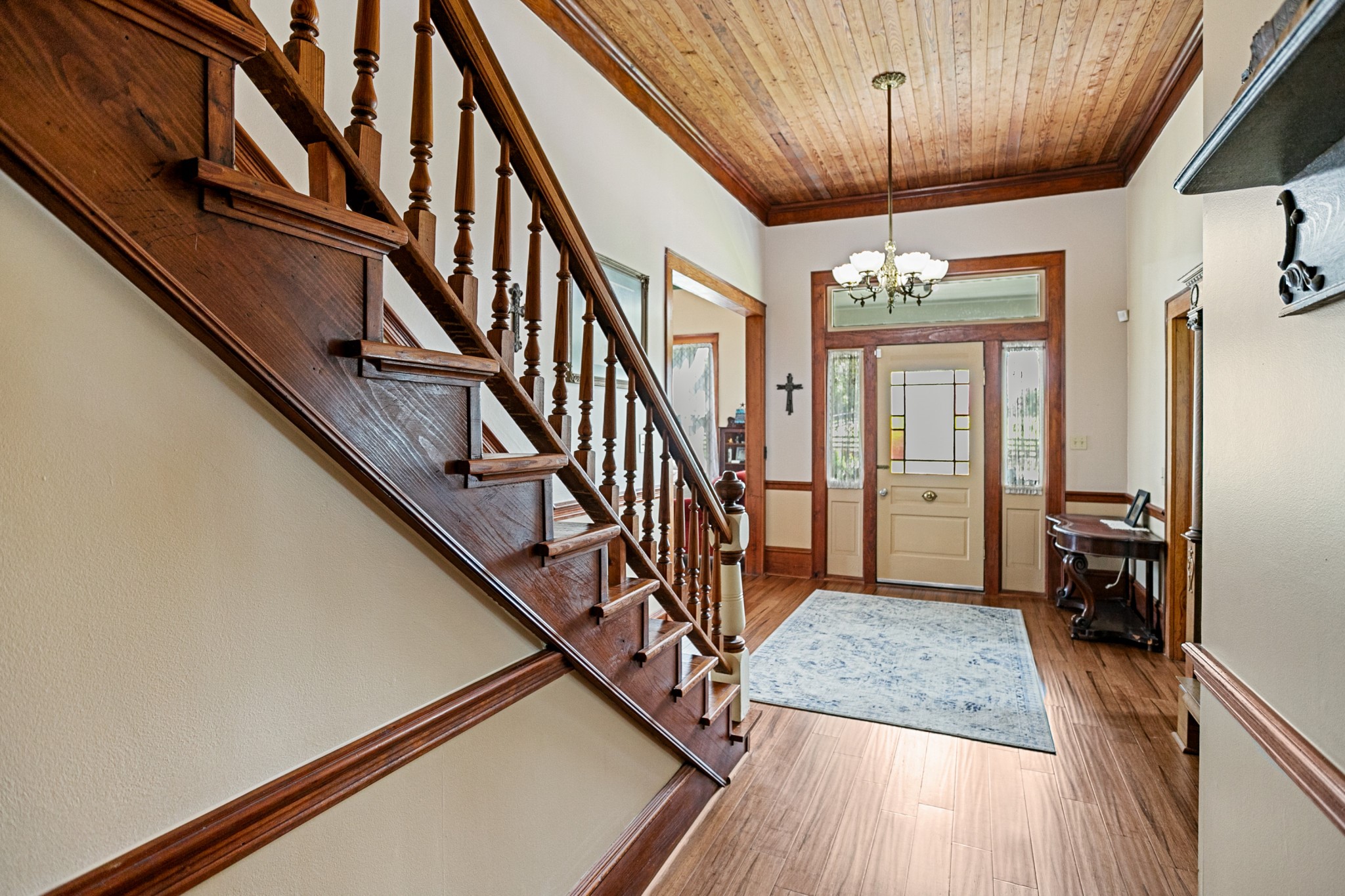 1034 South Tesch Street Bellville, TX 77418 - Photo 8 of 44 Beautiful original wood work on the staircaseay.