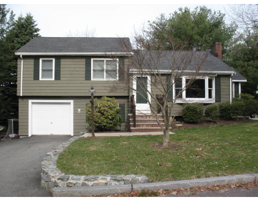 17 Hinds Road Winchester, MA 01890 - Photo 1 of 1 a front view of a house with a yard