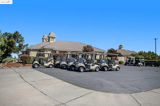 a view of a car is parked in front of house