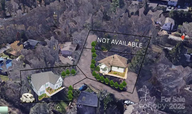 an aerial view of a house with a garden