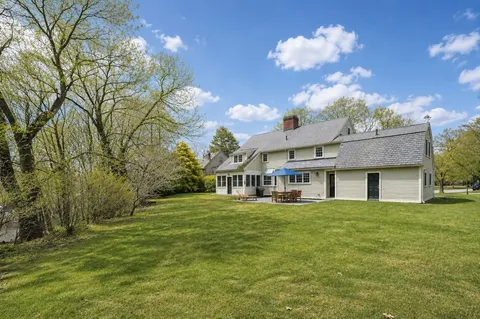 a view of a house with a big yard