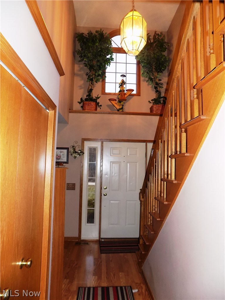 2120 Lynn Road Kent, OH 44240 - Photo 8 of 25 Foyer with hardwood flooring and shelf for decorations.