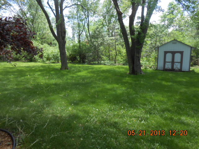 1512 Daly Road Wheaton, IL 60187 - Photo 2 of 20 a view of outdoor space with deck and garden